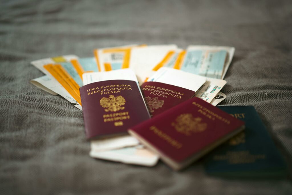 Close-up of Polish passports and travel tickets symbolizing travel and adventure.